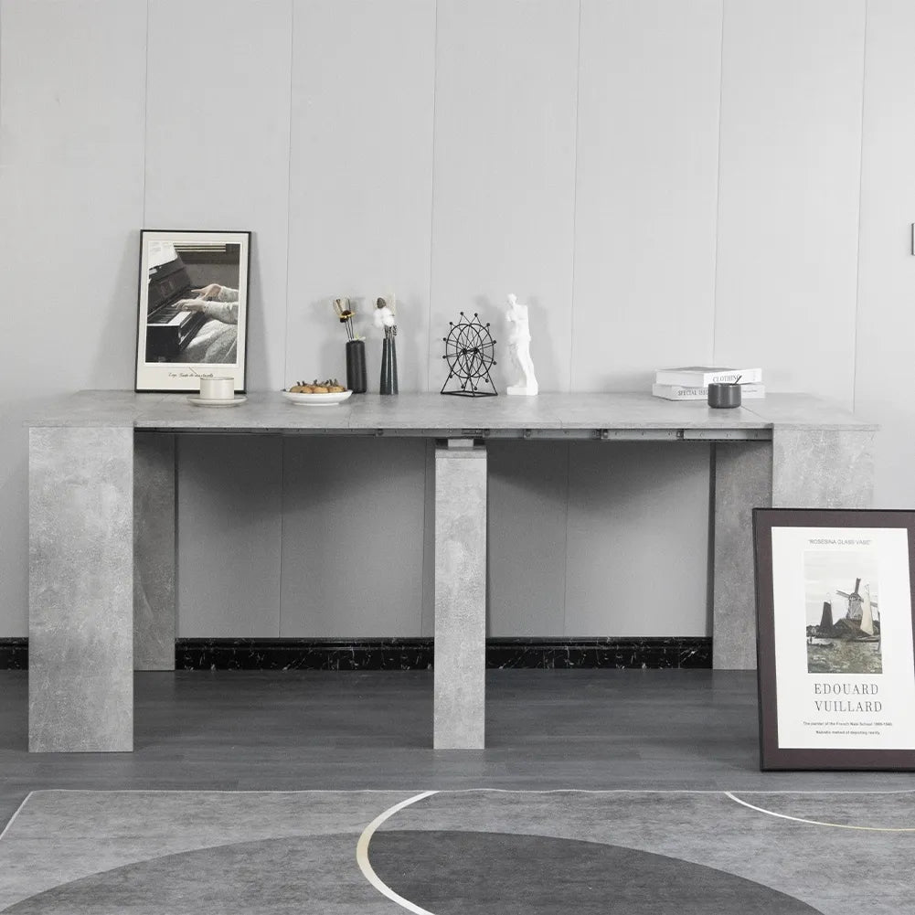 Consolle allungabile salvaspazio in legno MDF estensibile da 78 a 300 cm disponibile nelle finiture olmo, bianco frassinato e cemento.