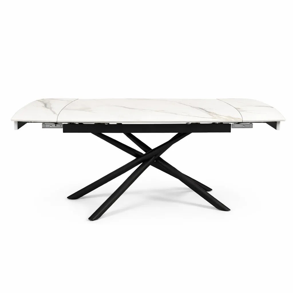 Tavolo allungabile a botte con piano in ceramica calacatta oro lucido o carrara opaco e base in metallo oro o nero.