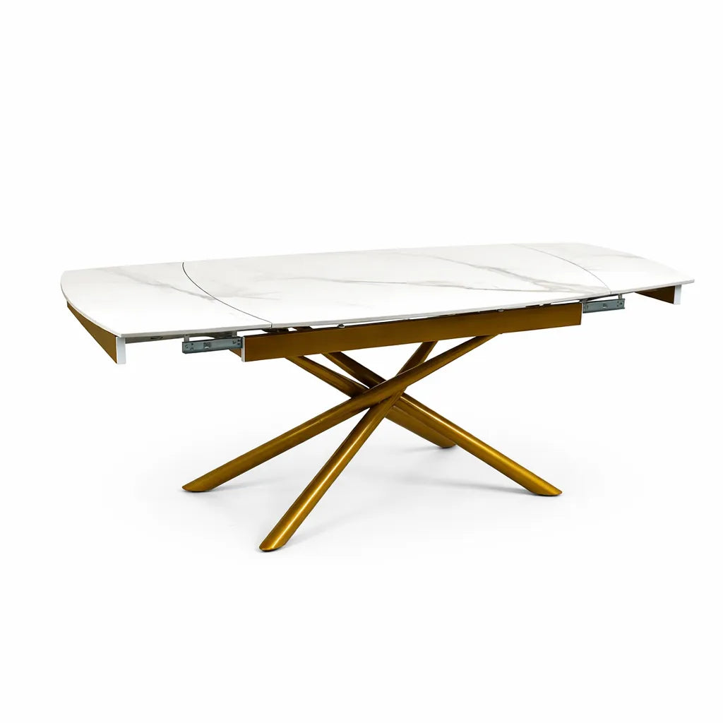 Tavolo allungabile a botte con piano in ceramica calacatta oro lucido o carrara opaco e base in metallo oro o nero.