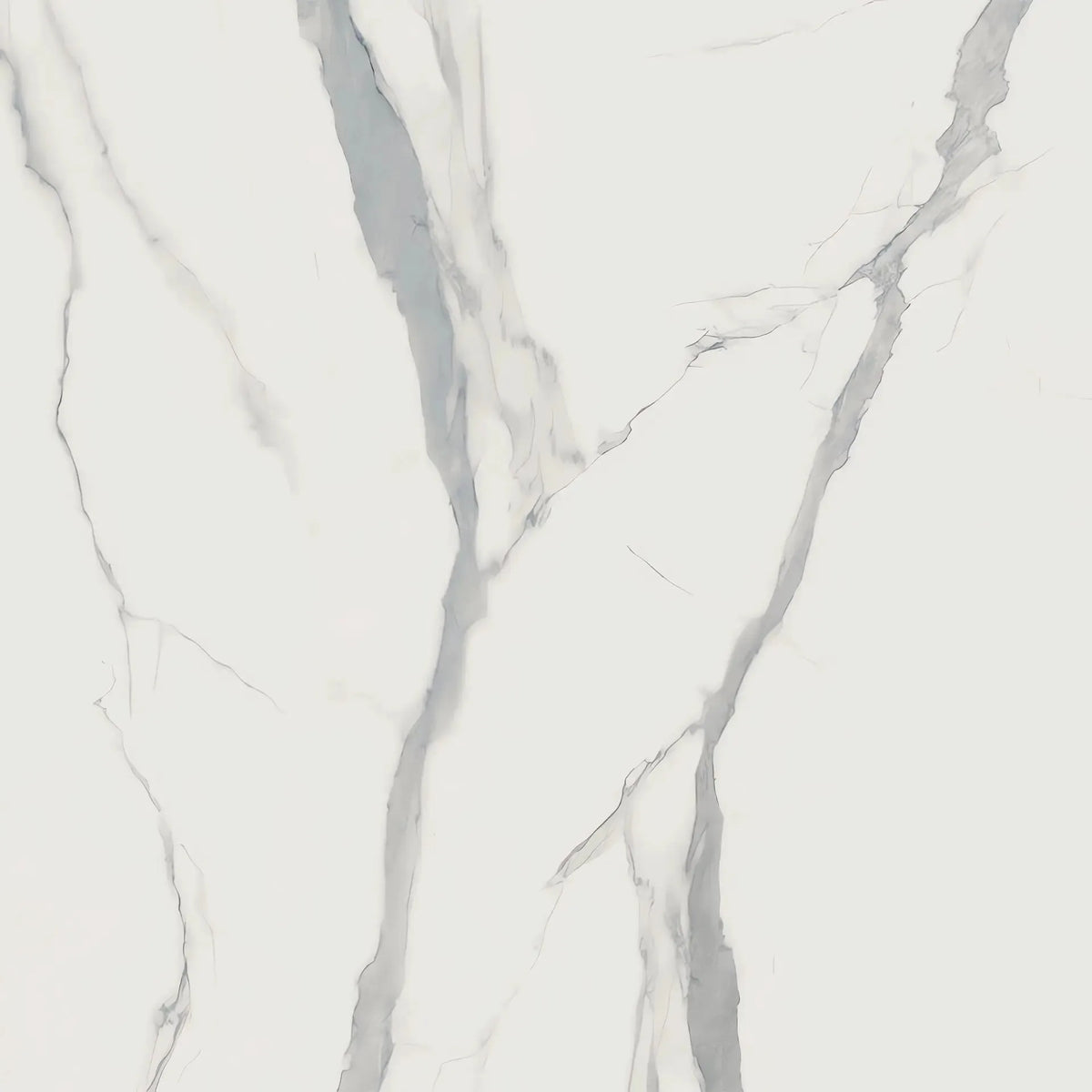 Tavolo allungabile a botte con piano in ceramica calacatta oro lucido o carrara opaco e base in metallo oro o nero.