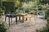 Sedia Curve policarbonato nero lucido con design moderno e linee intrecciate