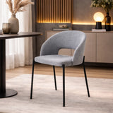 Sedia Greta imbottita in tessuto con gambe in metallo verniciato, disponibile in giallo, grigio e arancione
