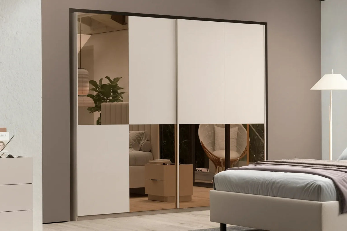 Camera da letto moderna Milano con letto contenitore, armadio scorrevole cashmere con specchi bronzati, comò e comodini