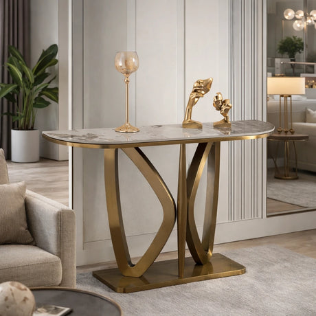 Consolle Roma con base in metallo oro dal design intrecciato e piano effetto marmo in ambiente moderno elegante