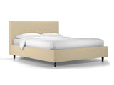Letto singolo Rio con contenitore in ecopelle, testata trapuntata a rombi e piedini alti. Ideale per spazi moderni e camere eleganti.

