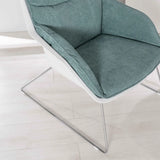 Poltrona Grace in tessuto imbottito sfoderabile con scocca in polipropilene e base in metallo dal design moderno ed elegante.