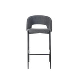 Sgabello Greta in tessuto grigio con schienale imbottito e gambe in metallo nero, ideale per penisola e cucina moderna