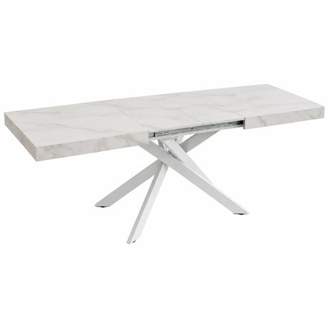 Tavolo allungabile Tokyo con struttura in metallo bianco e piano disponibile in rovere nodato, marmo carrara e cemento.
