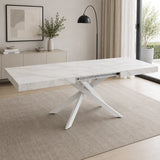 Tavolo allungabile Tokyo con struttura in metallo bianco e piano disponibile in rovere nodato, marmo carrara e cemento.