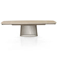 Tavolo allungabile Tom con piano in ceramica Travertino opaco e basamento in metallo Platino