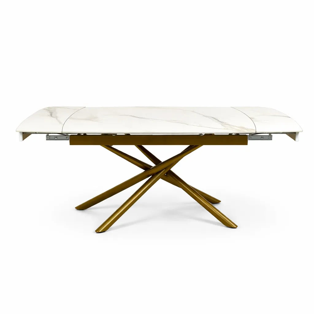 Tavolo allungabile a botte con piano in ceramica calacatta oro lucido o carrara opaco e base in metallo oro o nero.