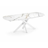 Tavolo allungabile Giove 140/200 cm con piano in ceramica effetto Marmo Oro Opaco e struttura in metallo bianco.