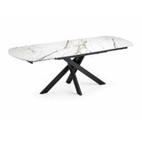 Tavolo allungabile Giove 140/200 cm con piano in ceramica effetto Marmo Oro Opaco e struttura in metallo nero.