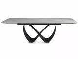 Tavolo Infinity Ceramic allungabile con top in vetroceramica effetto marmo bianco e struttura in metallo nero

