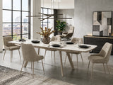 Tavolo allungabile Marte 140/200 cm con piano in ceramica effetto Marmo Oro Opaco e struttura in metallo verniciato Champagne.