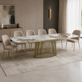 Tavolo Odisseo allungabile con piano in ceramica effetto marmo Onice lucido e basamento Champagne Oro opaco