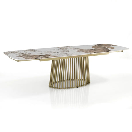 Tavolo Odisseo allungabile con piano in ceramica effetto marmo Onice lucido e basamento Champagne Oro opaco
